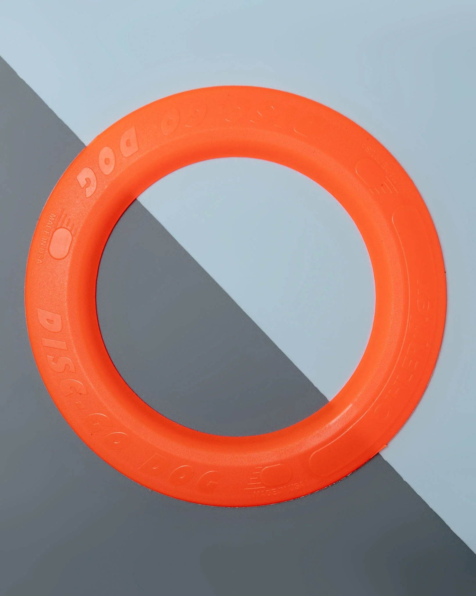 Disc-Go Dog Flying Disc in Orange (Made in the USA)