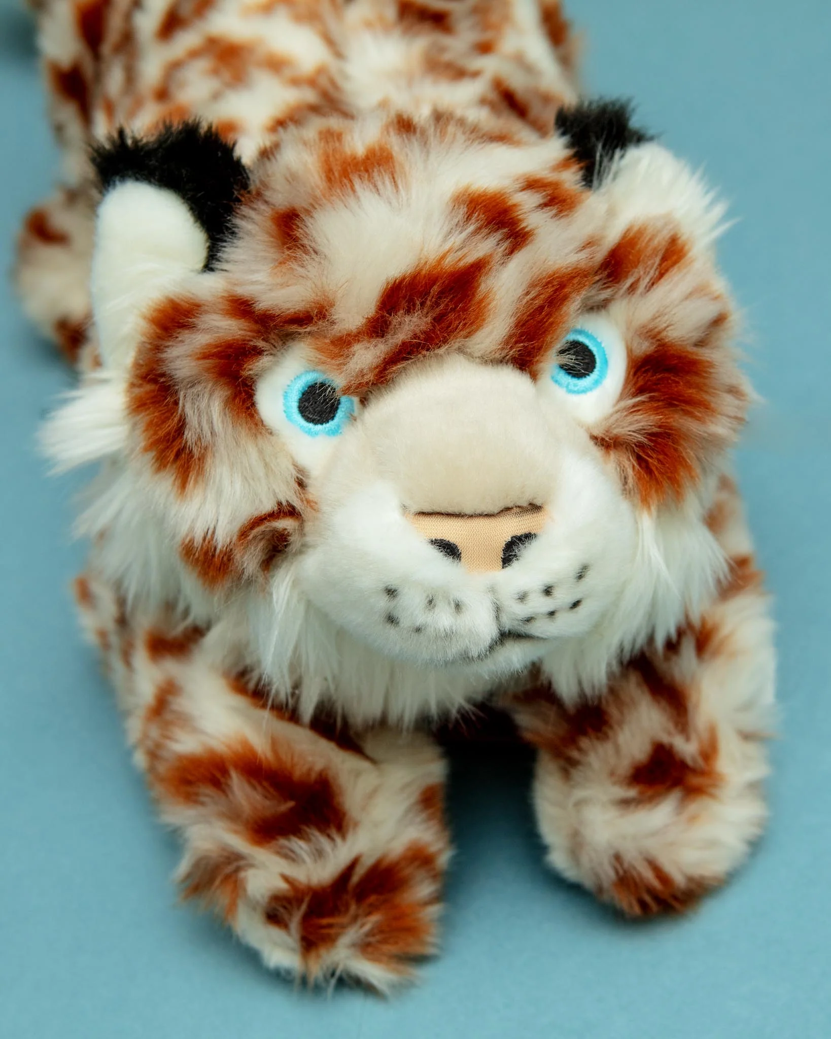 Mongo the Snow Leopard Squeaky Plush Dog Toy