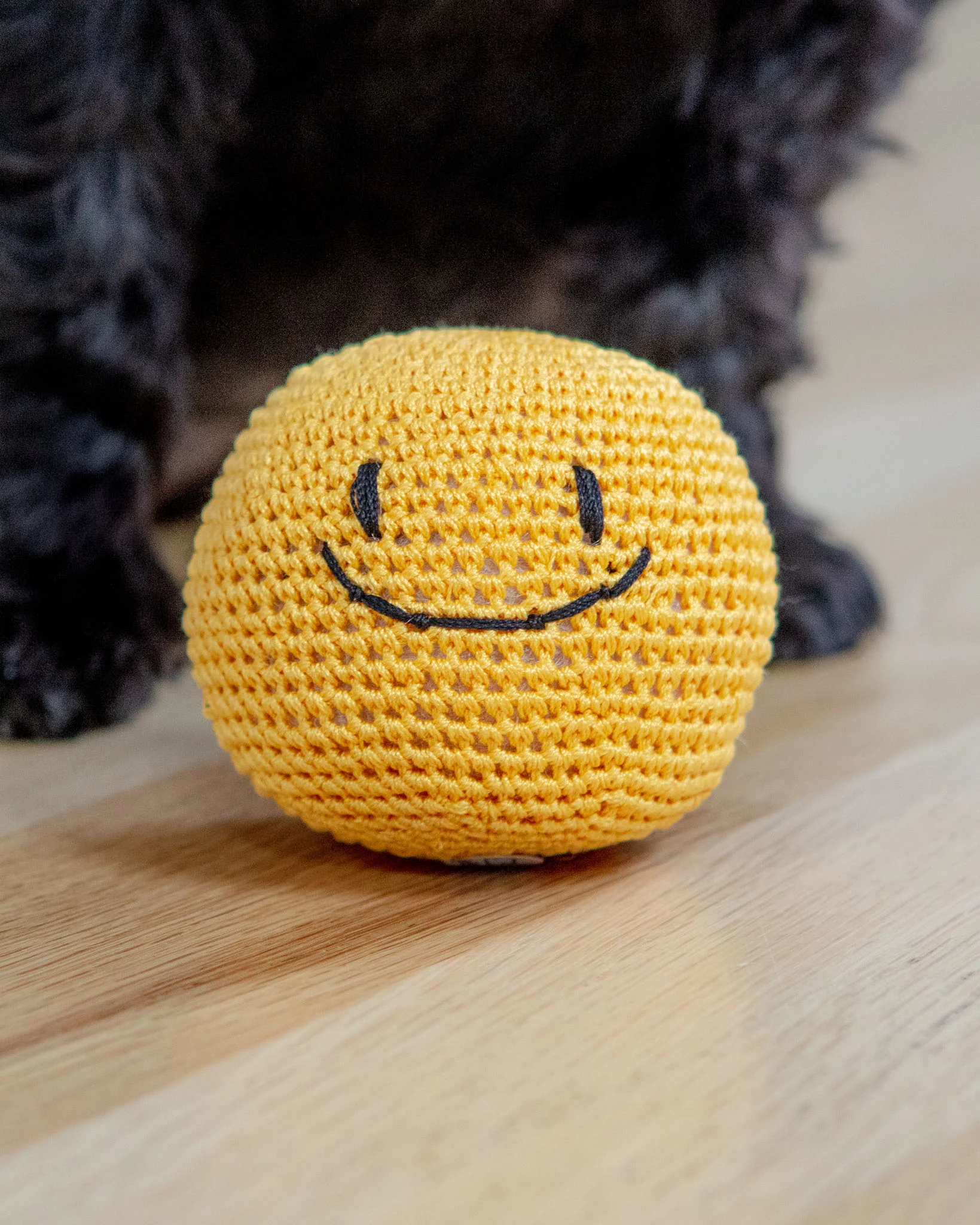 Smiley Face Dog Knit Squeaker Toy in Yellow - Image 3