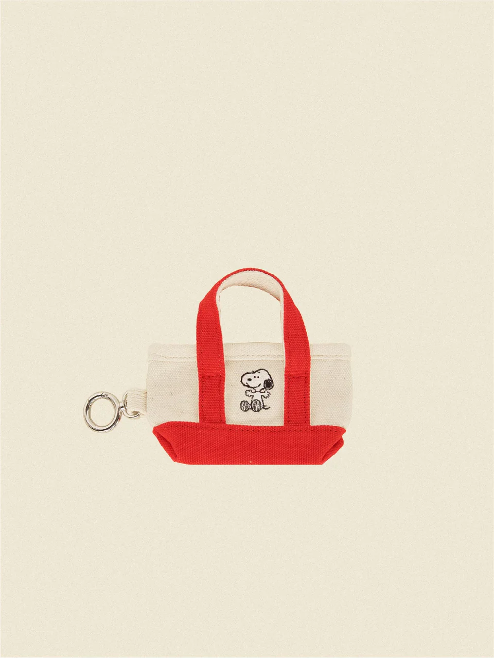 The Little Beast Snoopy Poop Bag Tote in Black or Red - Image 2